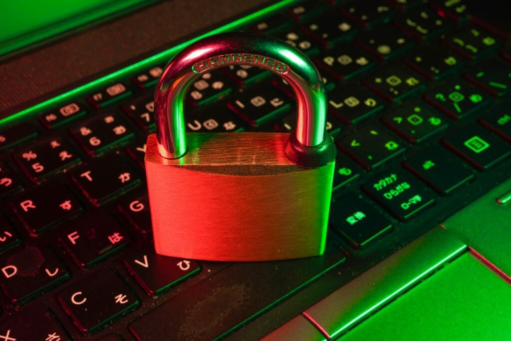 Laptop showing a digital lock representing playlist credential security